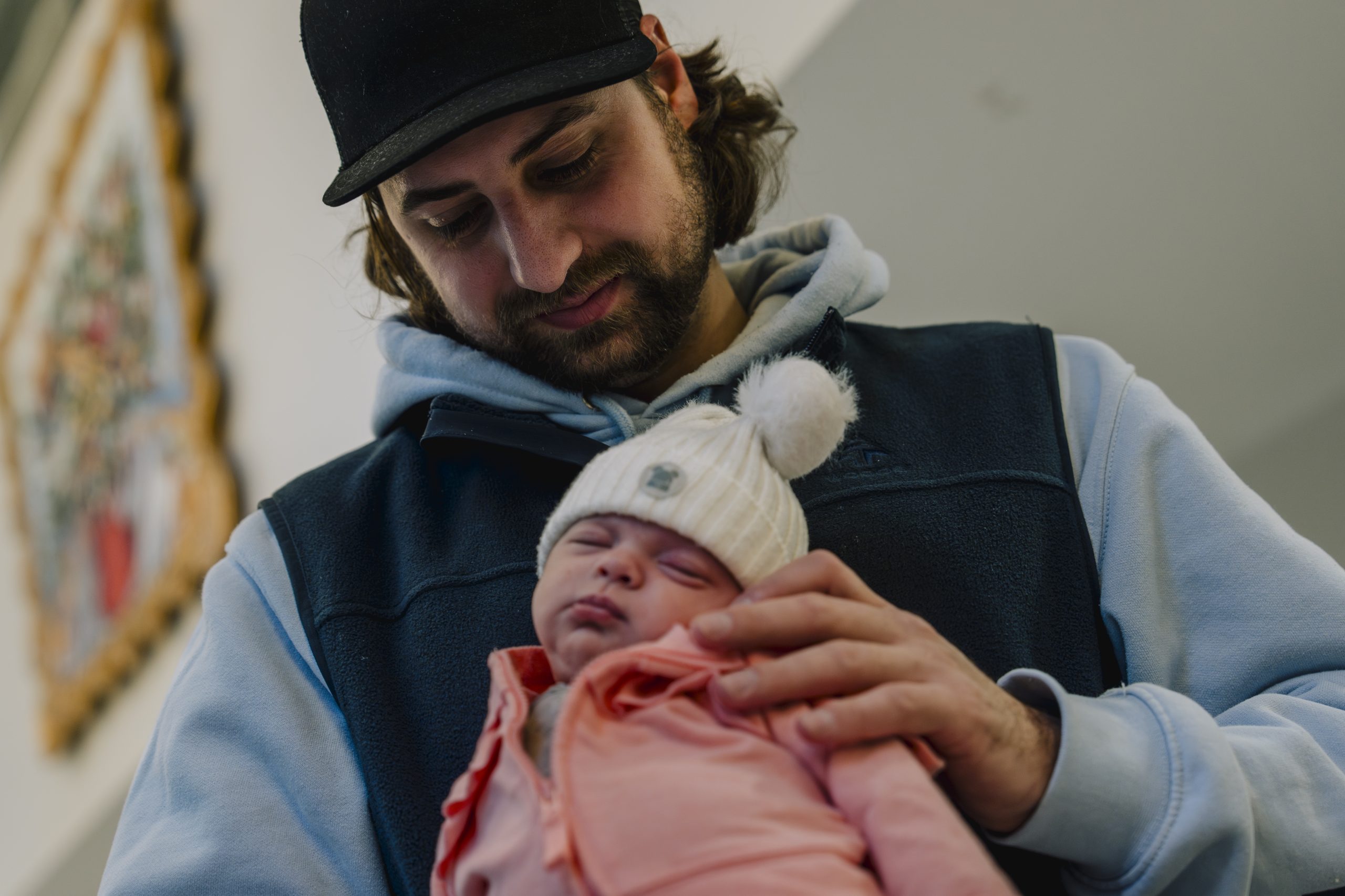 Dad holding a baby
